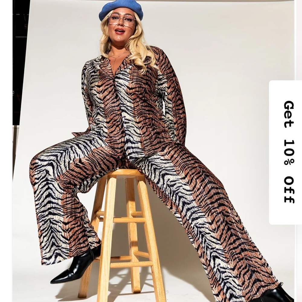Dressed in LALA Zebra Print Jumpsuit in Black and Brown